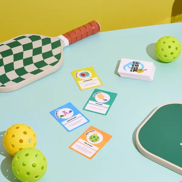 Pickleball Twist® decks and cards with paddles and balls